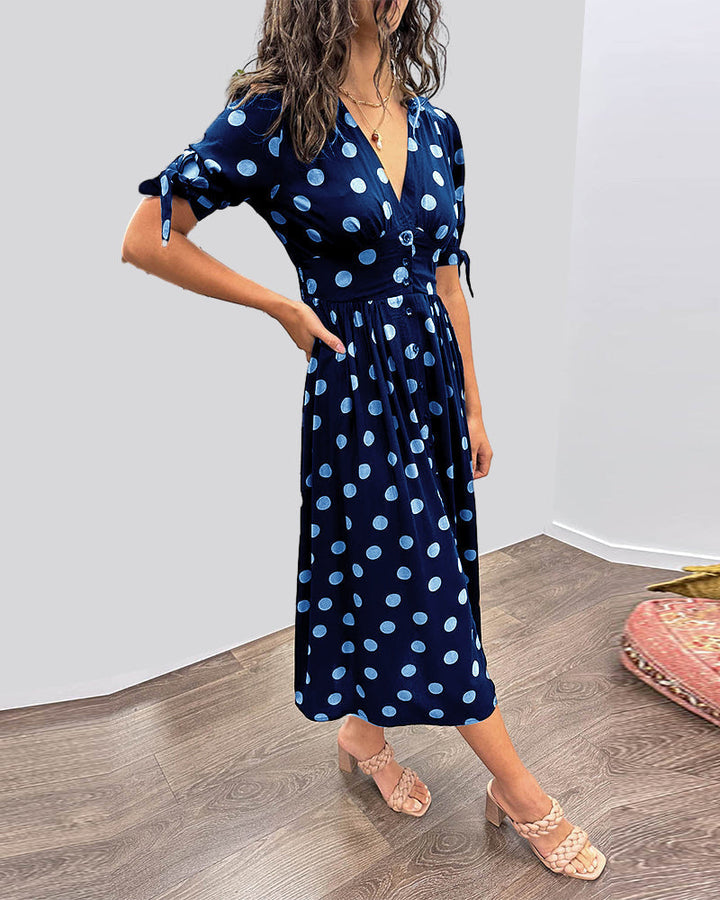 Mina | Abito con scollo a V e righe